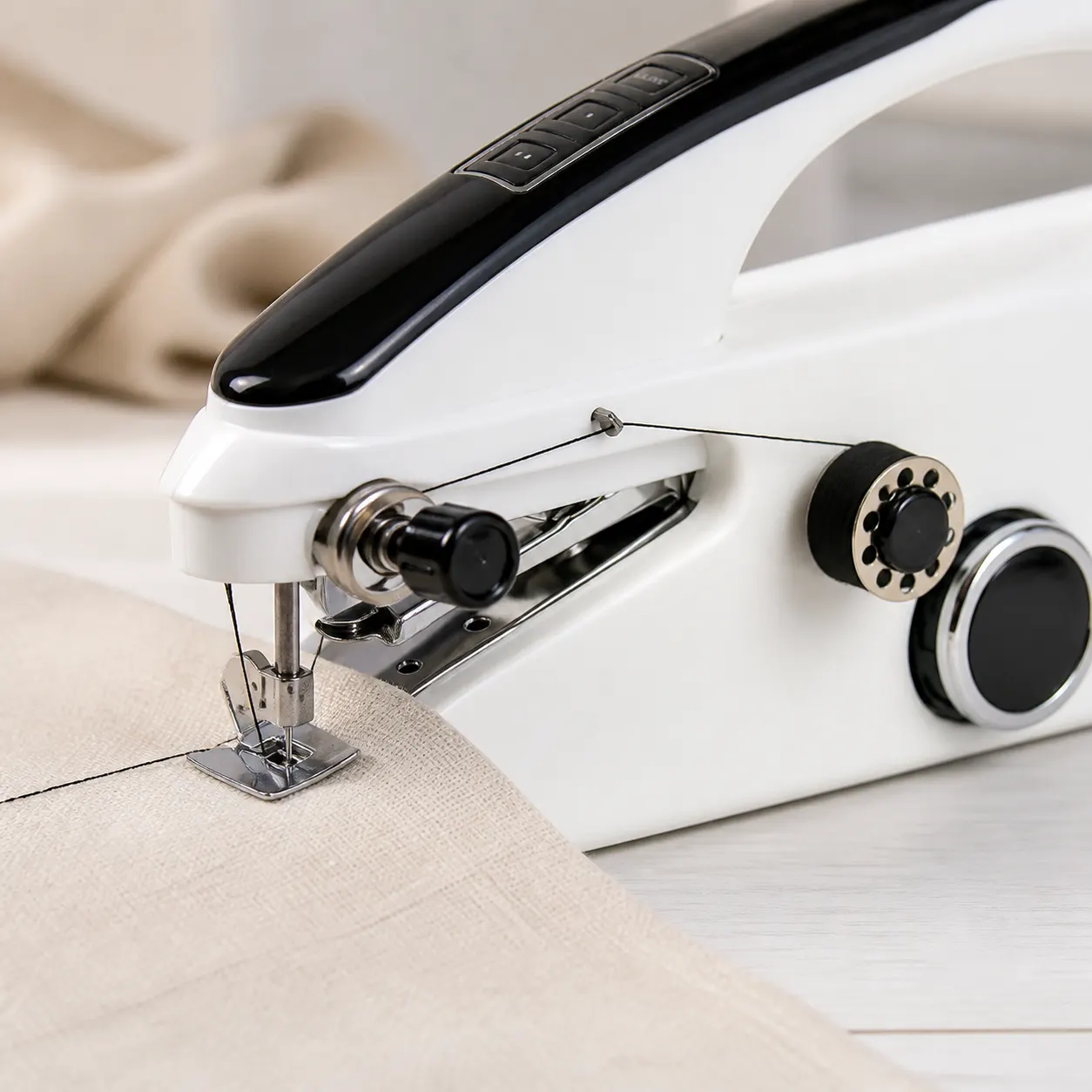 Handheld Sewing Machine detail view